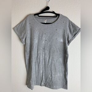 Mad style: Top with studs and silver streaks